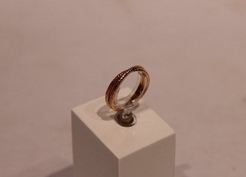 Forgyldt 925 sterling snoet ring af Christina Smykker.
5000m2 udstilling.