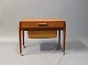 Lille sybord i teak med hjul af Dansk Design fra 1960erne. 
5000m2 udstilling.