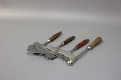 Different Cheese slicers and grate in rosewood. Danish Design from the 1960s. 
5000m2 showroom.