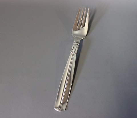 Dinner fork in Lotus, hallmarked silver.
5000m2 showroom.