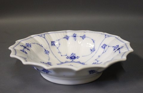 Royal Copenhagen blue fluted bowl with wavy edge #141.
5000m2 showroom.