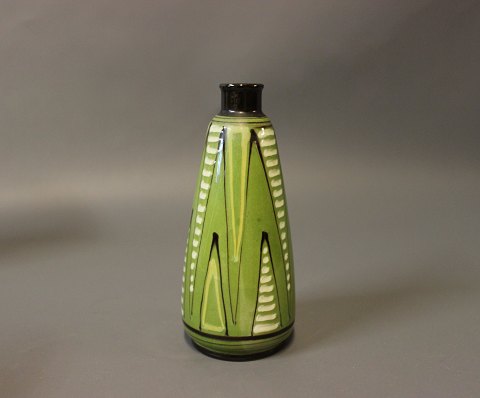 Ceramic vase with light green glaze by Herman A. Kähler.
5000m2 showroom.
