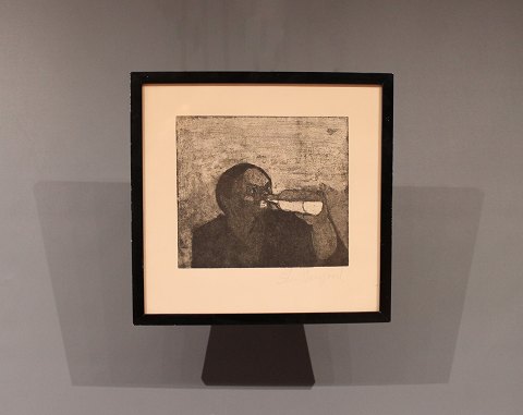 Small lithographic with illustration of a man drinking.
5000m2 showroom.