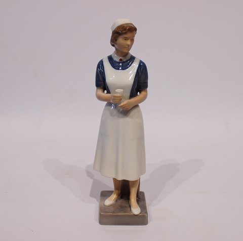 Royal Copenhagen porcelain figurine, Nurse, no.: 4507.
5000m2 showroom.