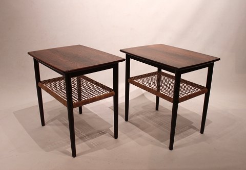 A pair of side tables of rosewood with papercord shelf of danish design from the 
1960s.
5000m2 showroom.