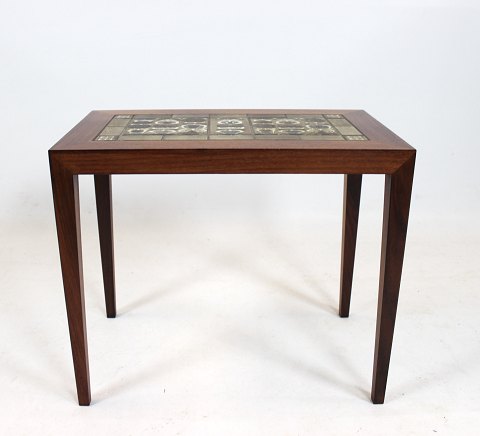 Side table of rosewood and brown tiles from Royal Copenhagen, by Severin Hansen 
for Haslev Furniture Factory from the 1960s. 
5000m2 showroom.