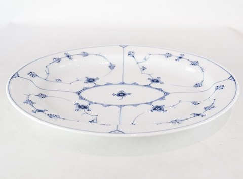 Blue fluted ovale dish, no.: 1/100 by Royal Copenhagen. 
5000m2 showroom.
