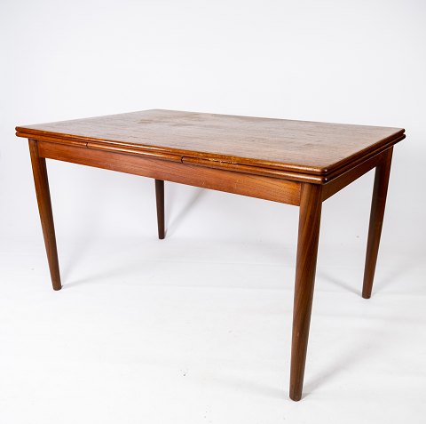 Dining table in teak with extensions of danish design from the 1960s.
5000m2 showroom.