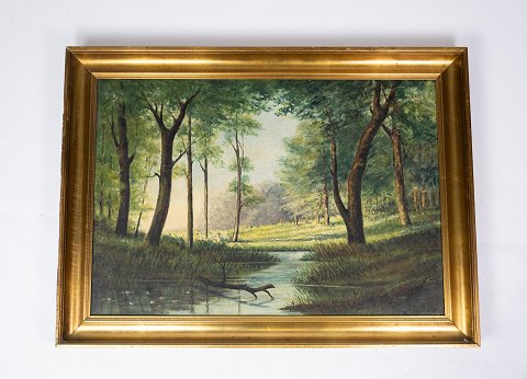 Oil painting with forrest motif and gilded frame.
5000m2 showroom.