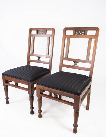 Set of two dining room chairs of mahogany and upholstered with black fabric, in 
great antique condition from 1910. 
5000m2 showroom.