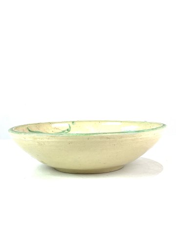 Ceramic dish with light glaze and decorated with green pattern, from the 1940s 
and signed H. 
5000m2 showroom.
Great condition
