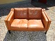 2 seater sofa in cognac colored leather in perfect condition Danish design from 
1960 of 5000 m2 showroom