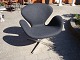 Svane stolen tegnet af Arne jacobsen i grå uld  
5000 m2 udstilling