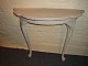 Half round console table from around the year 1920, painted grey. 
5000m2 showroom.