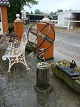 Old sundial on stone socle. 5000m2 Showroom.