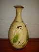 Vase af Herman kähler.
Højde. 27 cm og  i perfekt stand.
5000m2 udstilling.