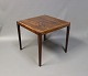 Small lamptable in rosewood and from the 1960s.
5000m2 showroom.