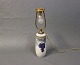 Royal Copenhagen bordlampe i porcelæn og messing, nr. 587/67. Lampen er lavet 
mellem 1889 og 1922.
5000m2 udstilling.