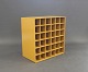Bookcase in yellow by Montana with 36 smaller spaces for wine or similar.
5000m2 showroom.
