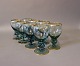 A set of 8 green glass with a gilded edge.
5000m2 showroom.
