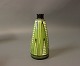Ceramic vase with light green glaze by Herman A. Kähler.
5000m2 showroom.