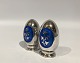 Salt and pepper shakers in 925 sterling silver and dark blue enamel by MEKA.
5000m2 showroom.