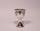 Egg cup in Art Noveau style from the 1930s and of hallmarked silver.
5000m2 showroom.