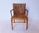 Armchair, model PJ-301, in mahogany and with cushions of light brown patinated 
leather  by Ole Wanscher and PJ Furniture, from the 1960s.
5000m2 showroom.