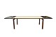 Large dining table with two extention leaves in Corian and oak of danish design 
from the 1980s.
5000m2 showroom.