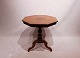 Italian lamp table of handpolished mahogany with inlaid intarsia of fruit wood 
from the 1880s.
5000m2 showroom.