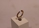 Forgyldt 925 sterling sølv ring med zirkon og åbning af Christina Smykker.
5000m2 udstilling.