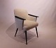 Hvilestol polstret med fåreuld og med arme af sortmalet træ af dansk design fra 
1960erne. 
5000m2 showroom.