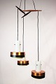 Ceiling pendant of copper and rosewood of danish design from the 1960s.
5000m2 showroom.
