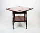 Antique game table of mahogany with extentions from around the year 1880.
5000m2 showroom.