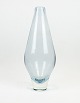Glass vase in ice blue color by Holmegaard.
5000m2 udstilling.