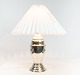Silvered table lamp in Jugend style from around the 1930s.
5000m2 showroom.
