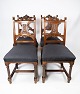 Set of four dining room chairs in walnut and newly upholstered with black 
fabric, from the 1890s. 
5000m2 showroom.