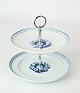 Two part cake centerpiece in Aluminia, no.: 11/2847-2855, by Royal Copenhagen.
5000m2 showroom.
