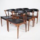 Sæt af seks spisestuestole i palisander og nypolstret med sort  elegance læder, 
designet af Johannes Andersen, model BA113, fremstillet af Brdr. Andersens 
møbelfabrik A/S. 1960erne.
5000m2 udstilling.