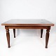 Dining table in  mahogany with dark top plate and extensions, in great antique 
condition from around 1930. 
5000m2 showroom.
