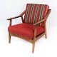 Armchair in oak and upholstered with red fabric, designed by H. Brockmann 
Pedersen in the 1960s.
5000m2 showroom.